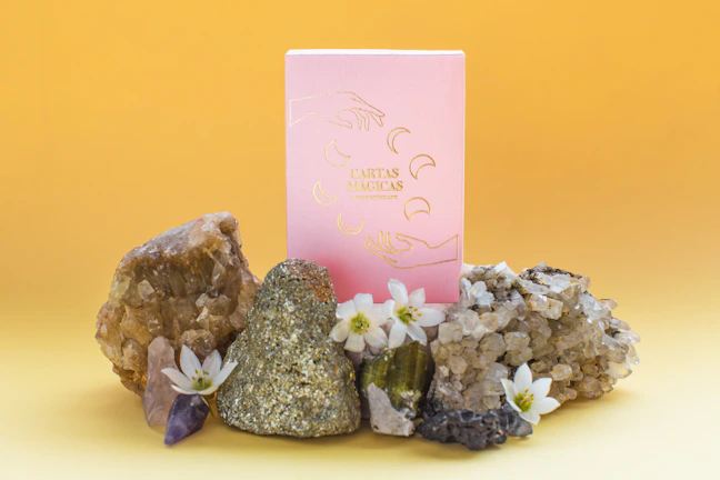 Retailers inspecting bulk boxes of pink opal cosmetics in a showroom.