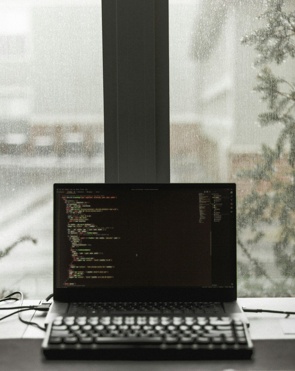 black laptop computer displaying brown screen