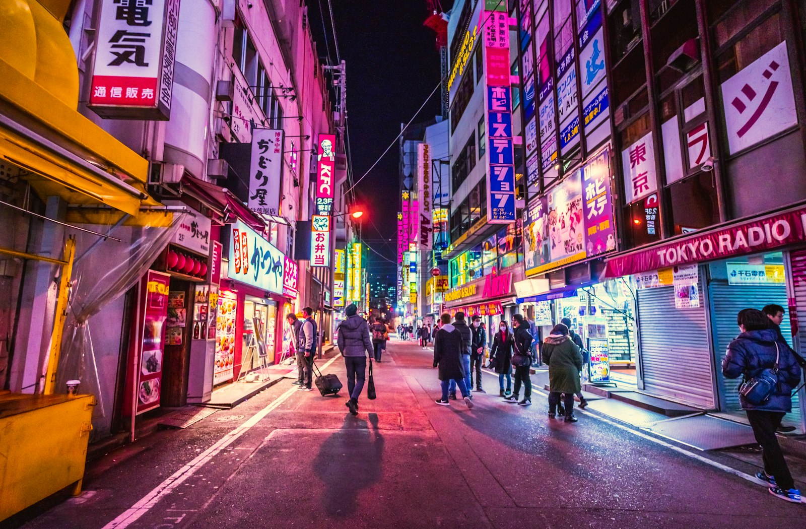Rain-slicked neon streets of Kabukicho