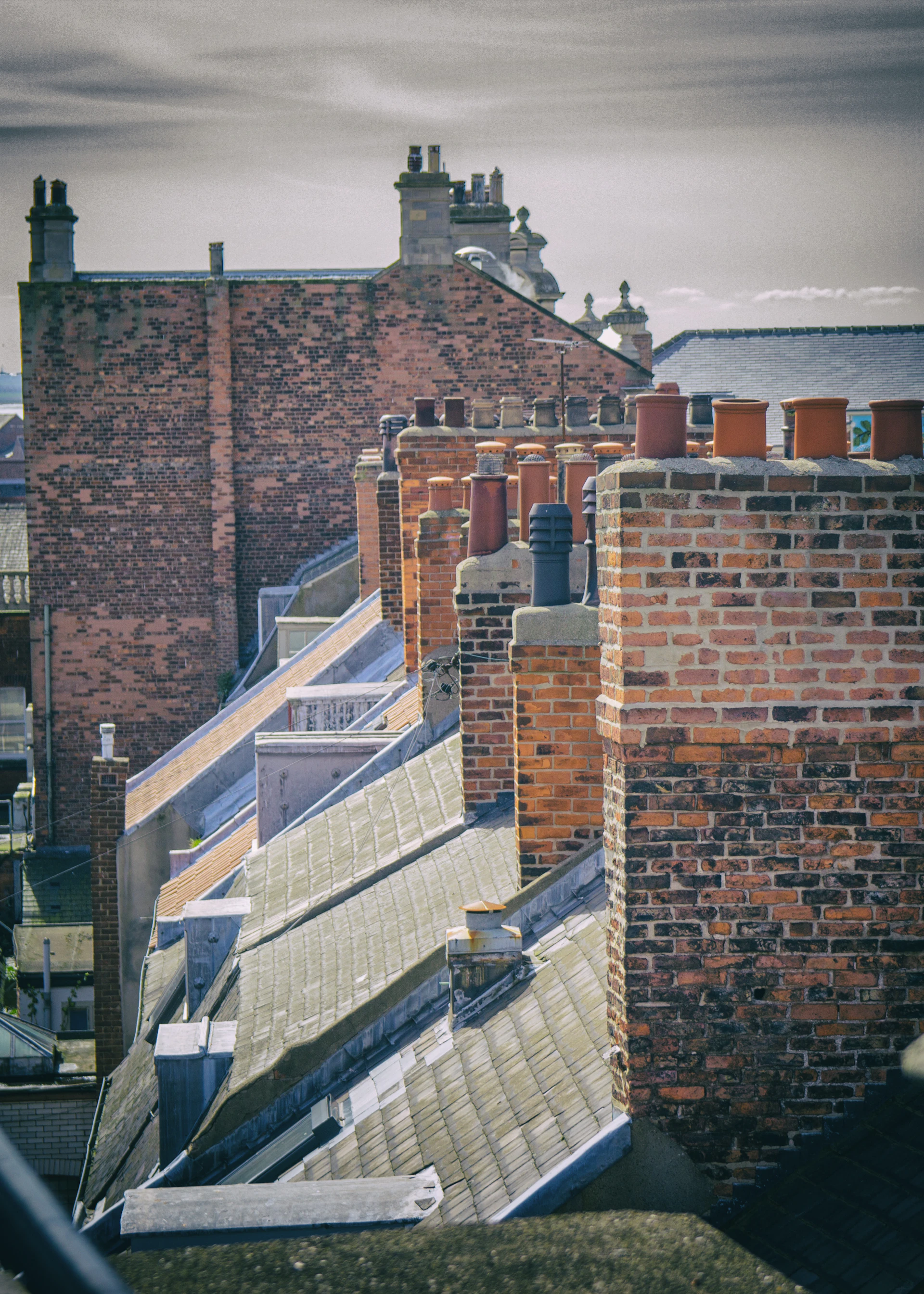 UK terraced houses with tiled roofs