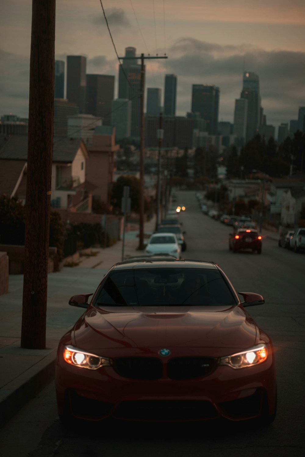 red car on road during nighttime