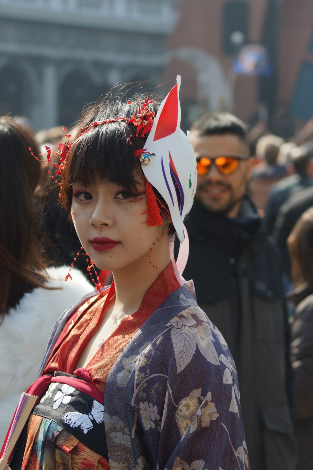 woman wearing floral kimono dress