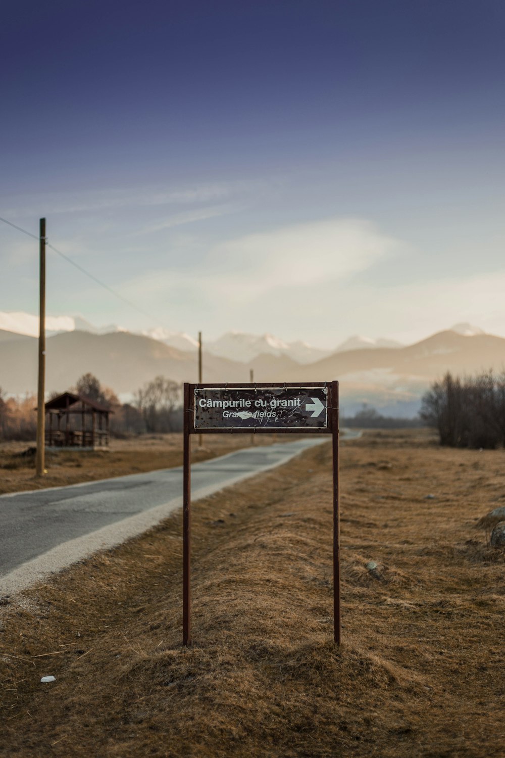 black signage beside road