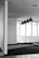 A spacious office environment featuring sleek vinyl flooring and contemporary furniture.