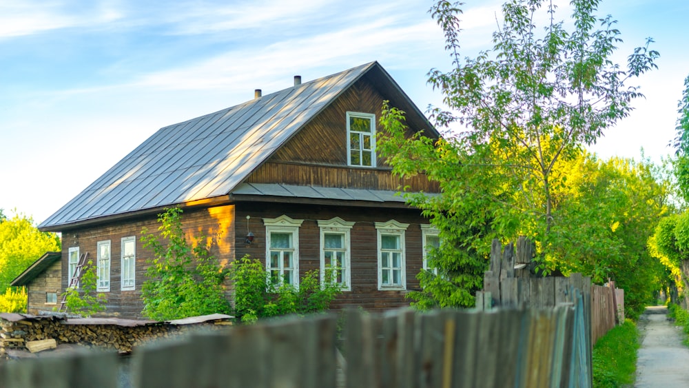 selective focus photography of house beside road