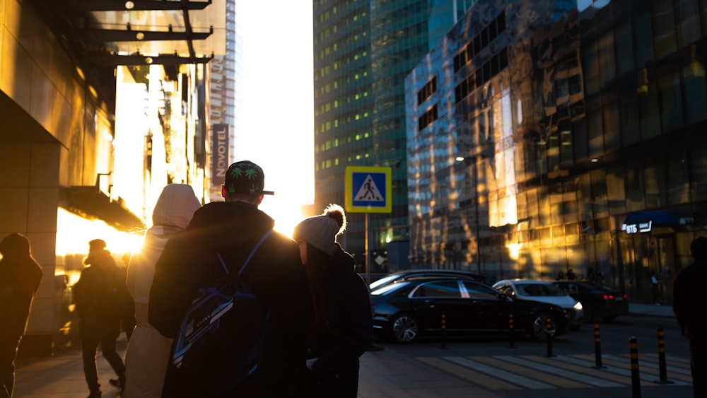 man walking on sidewalk during daytime