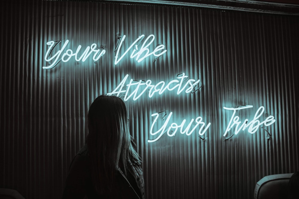 your vibe attracts your tribe lighted signage