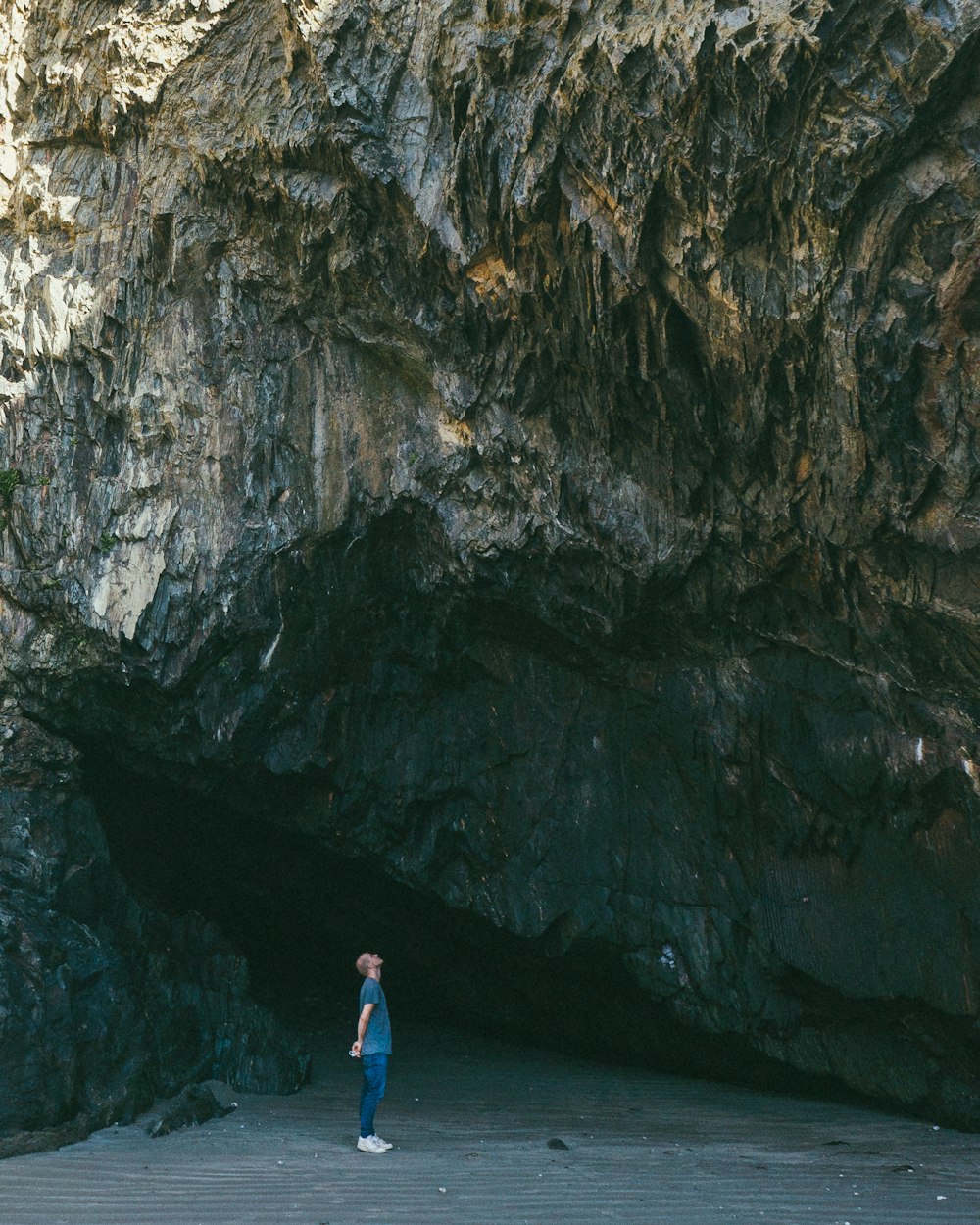 man standing on rock