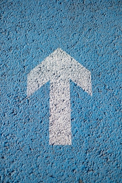 white arrow up