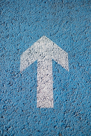 white arrow up