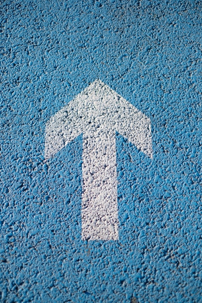 white arrow up