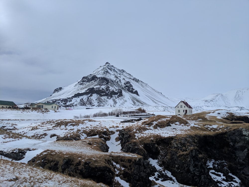 cone mountain covered by snow