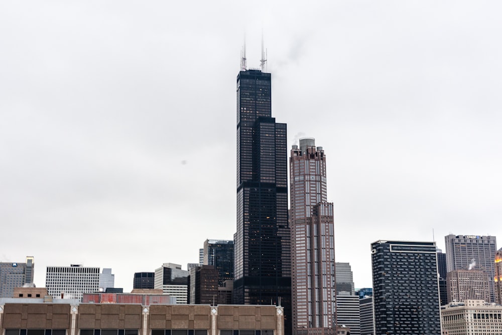 high-rise buildings under clouded sky