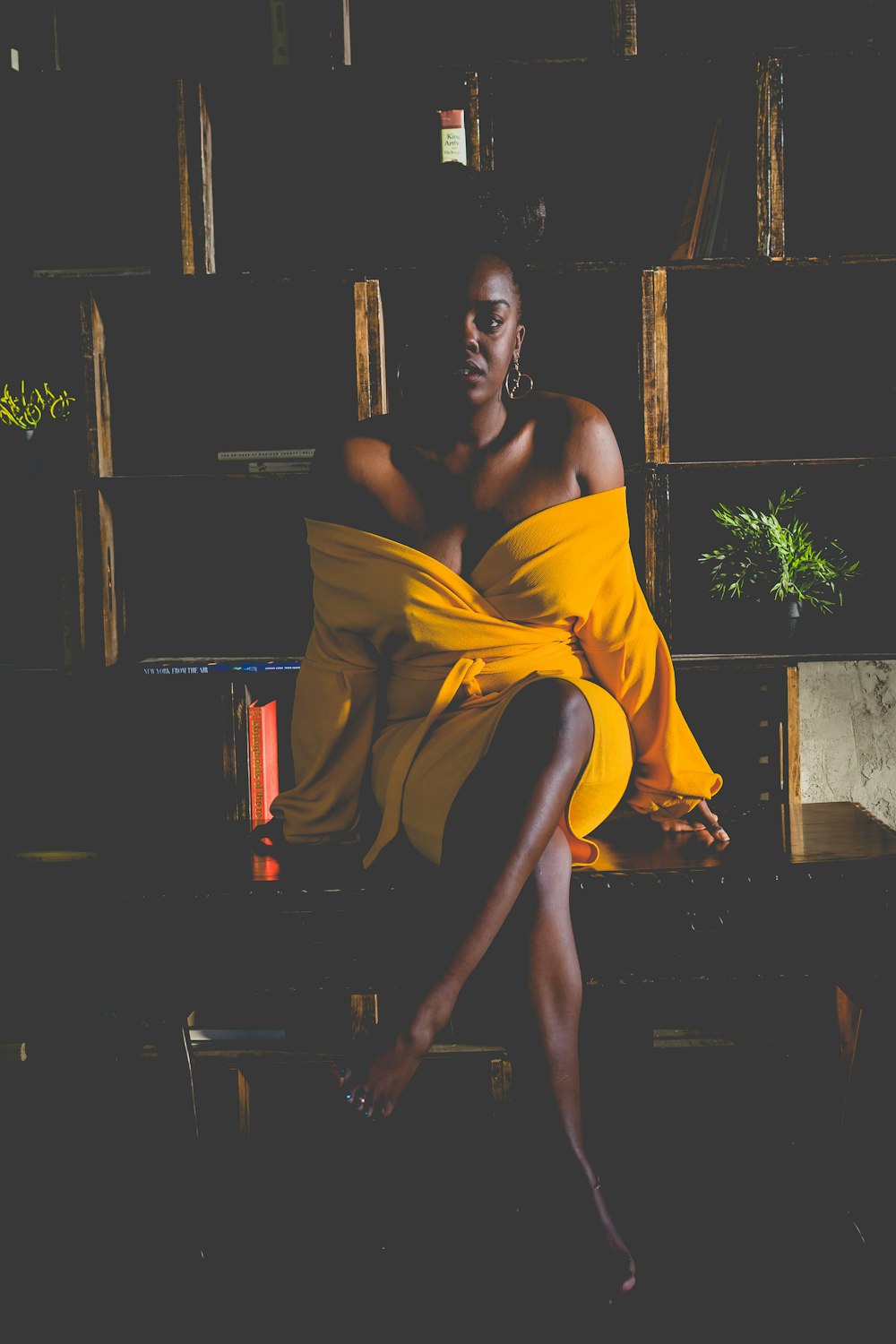 woman sitting on chair with cross legs