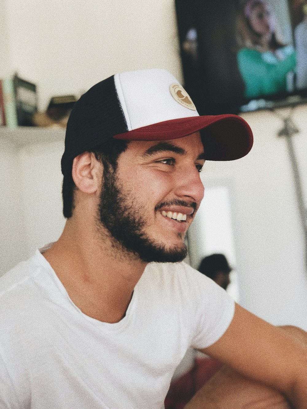 man smiling inside room