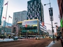 cars on road near building during daytime