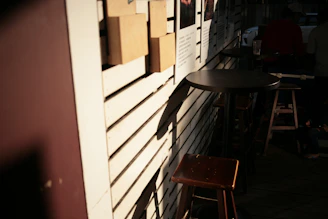 An inviting outdoor seating area bathed in golden afternoon light, perfect for a relaxed meal.