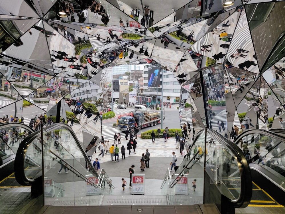 people inside glass building