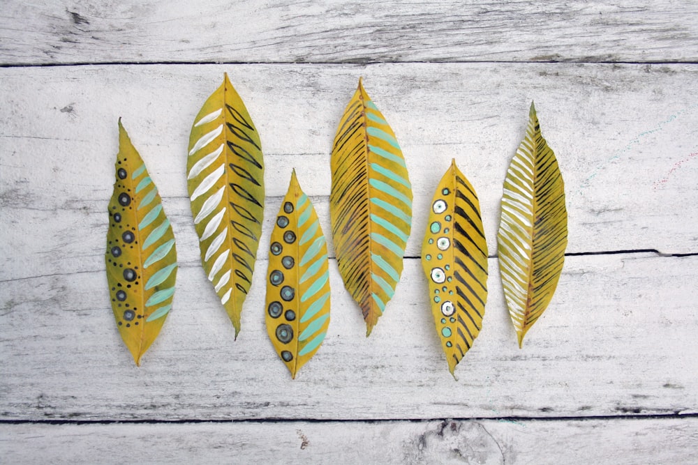 leaves with painting on wooden top