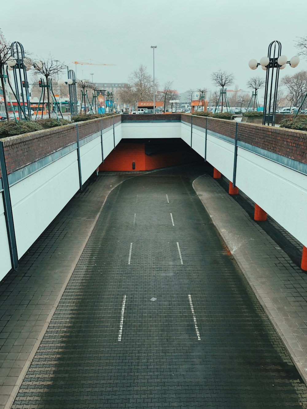 empty gray concrete road at daytime