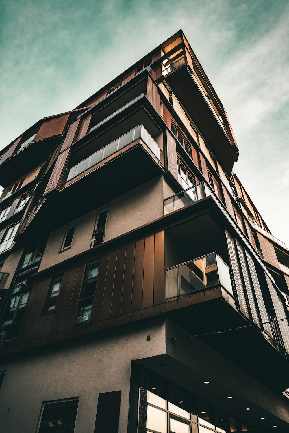 low angle photography of brown concrete building
