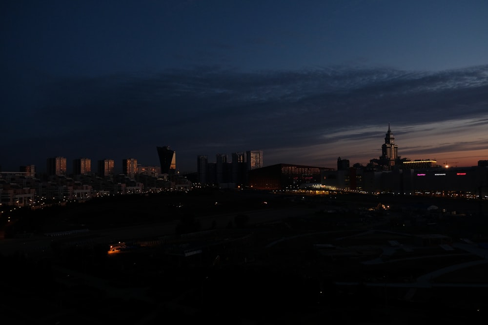 silhouette of buildings at nighttime