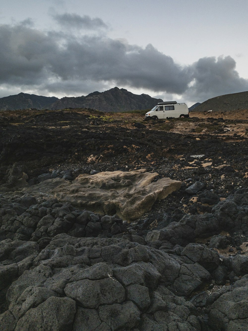 white van passing through road