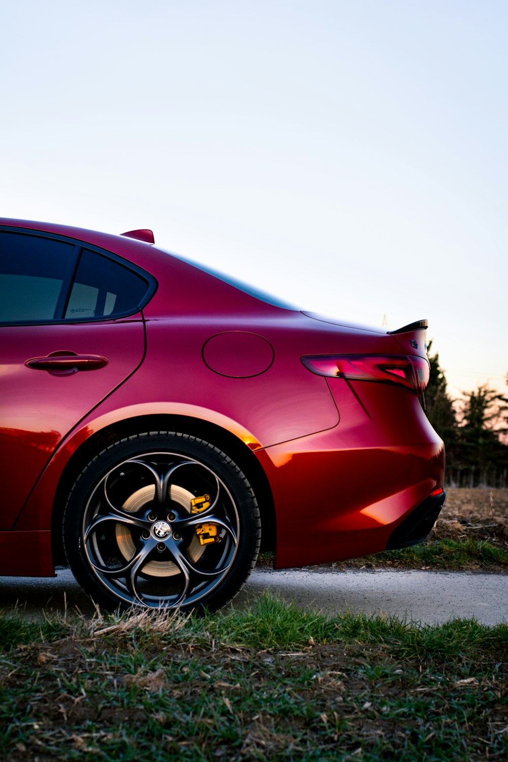 red car with flower-shaped rear wheel