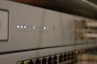 A close-up of a modern IoT device connected to a network.