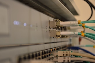 a bunch of wires are connected to a wall