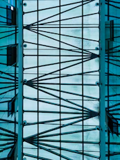 a view of the ceiling of a building from below