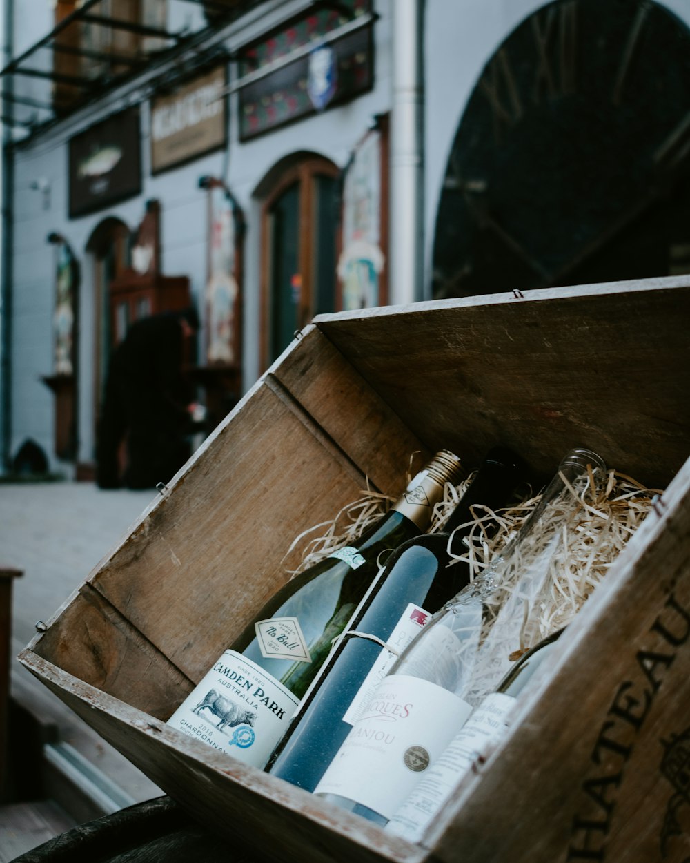 wine bottles in brown wooden crate