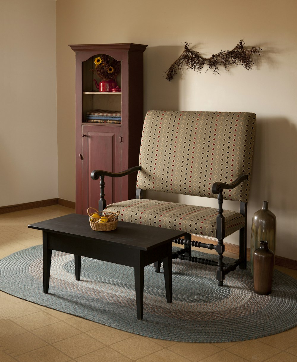 rectangular brown wooden coffee table beside brown sofa