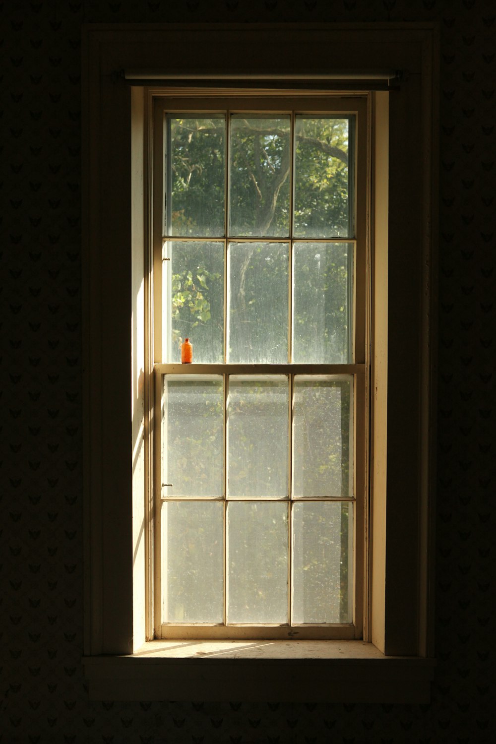 closed beige framed glass door