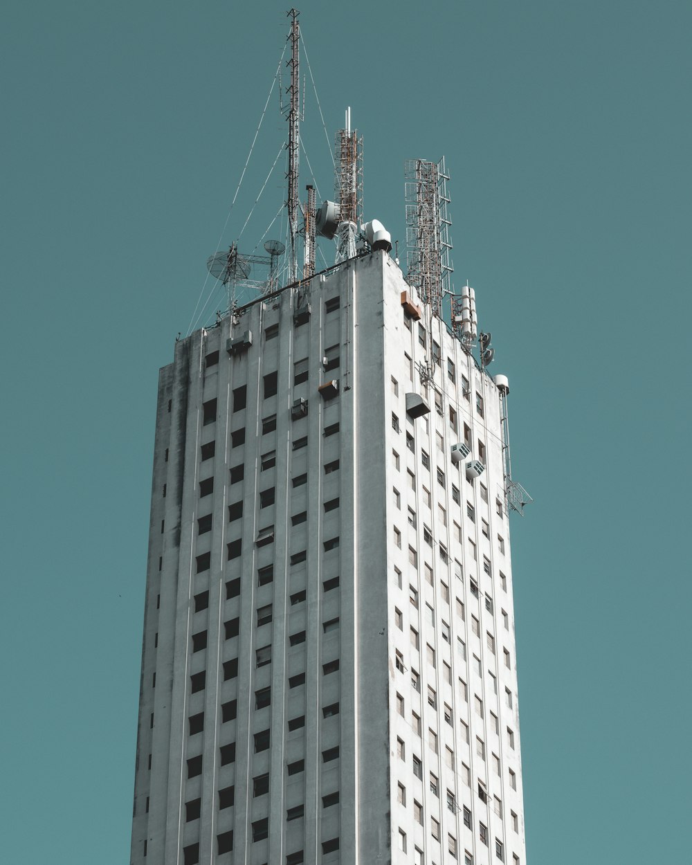 low angle photography of white high rise building