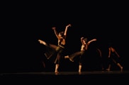 two woman dancing on the stage