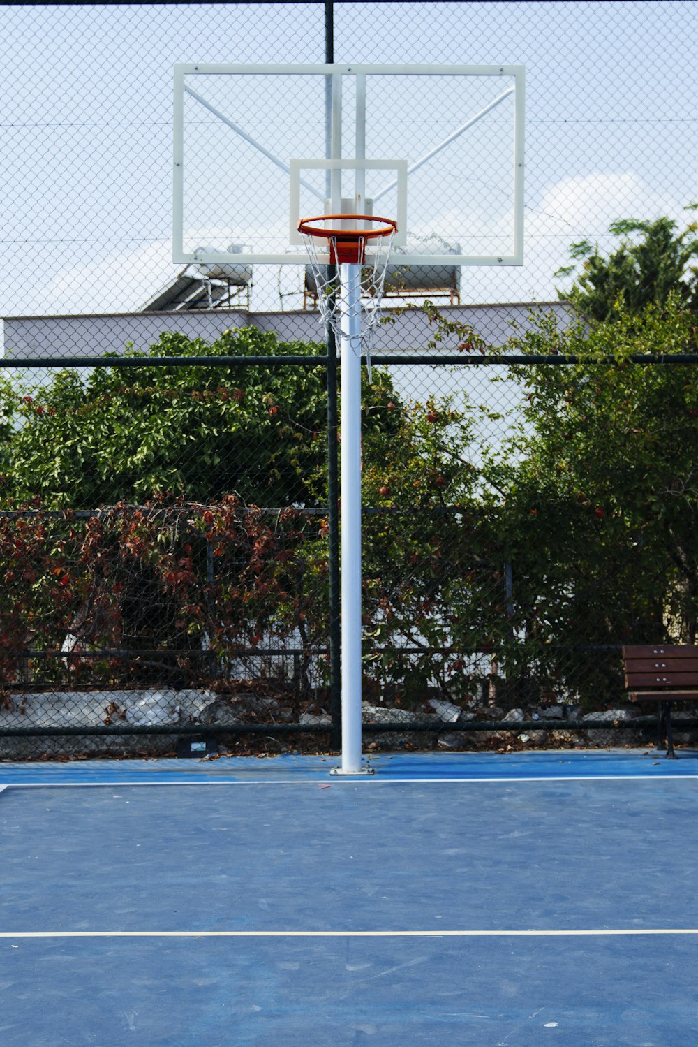 empty basketball court during daytime