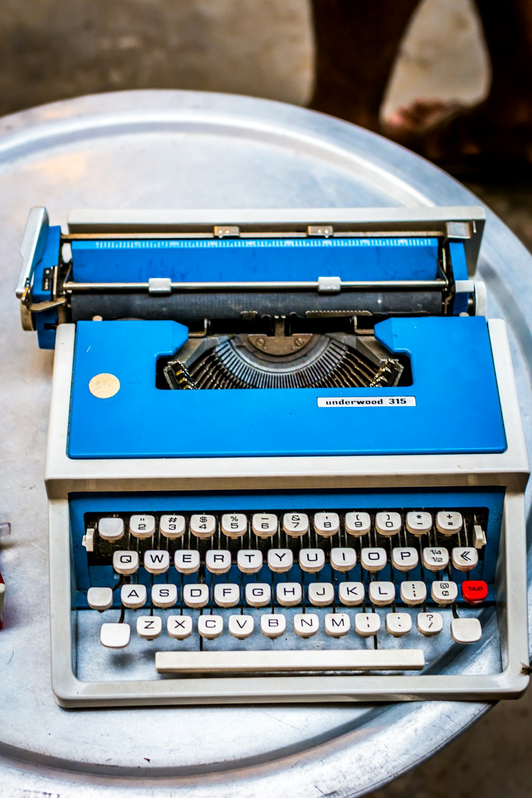 blue and white type writer
