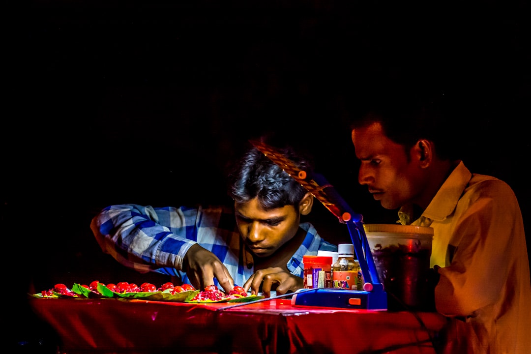 two man beside table