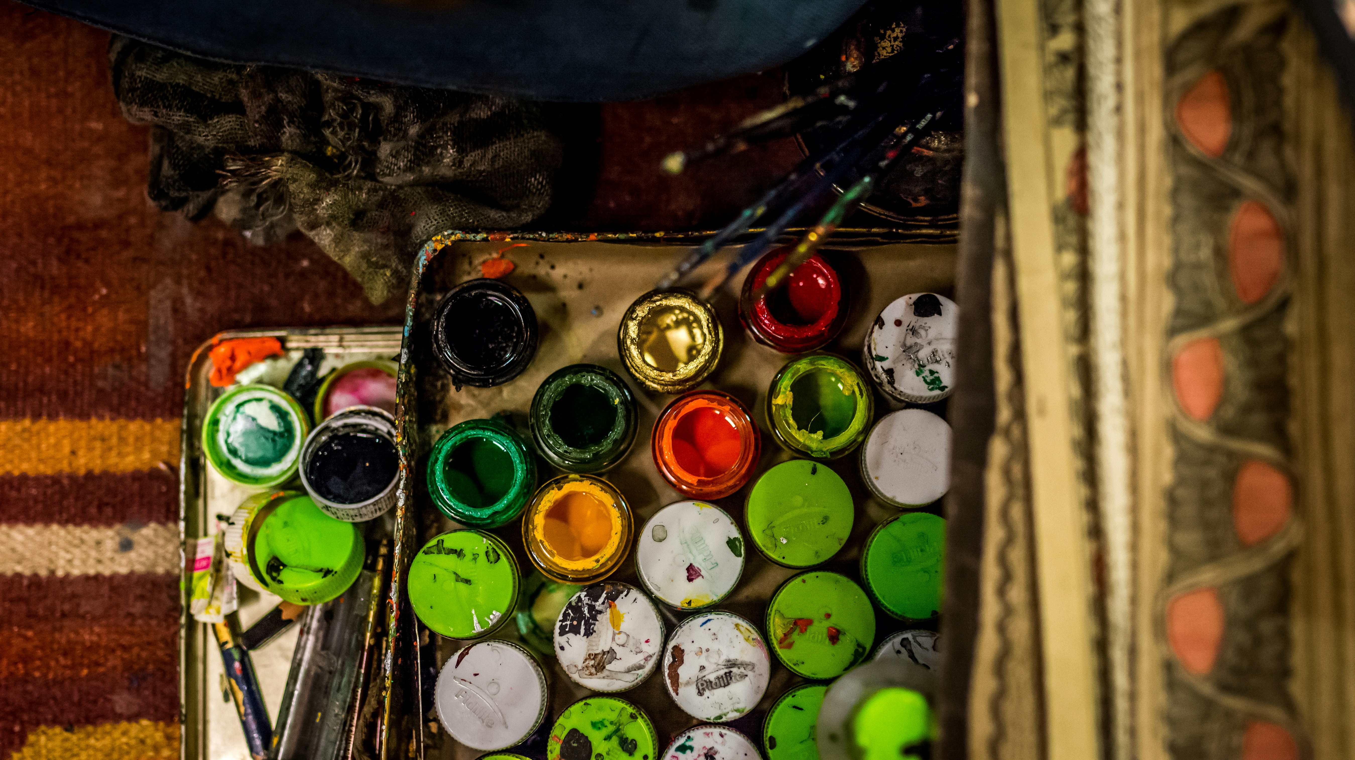 Opened assortedcolor paint lot photo Free Painter Image on Unsplash