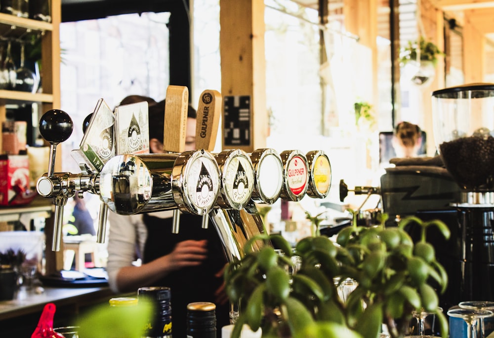 person in bar serving beer