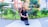 woman sitting on concrete surface near plants during daytime