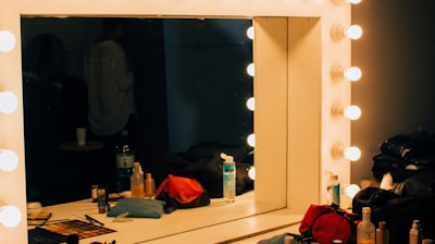 turn-on light white wooden vanity mirror