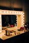 turn-on light white wooden vanity mirror