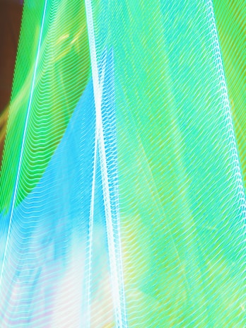 Abstract technology background featuring digital grids and smooth animation lines.