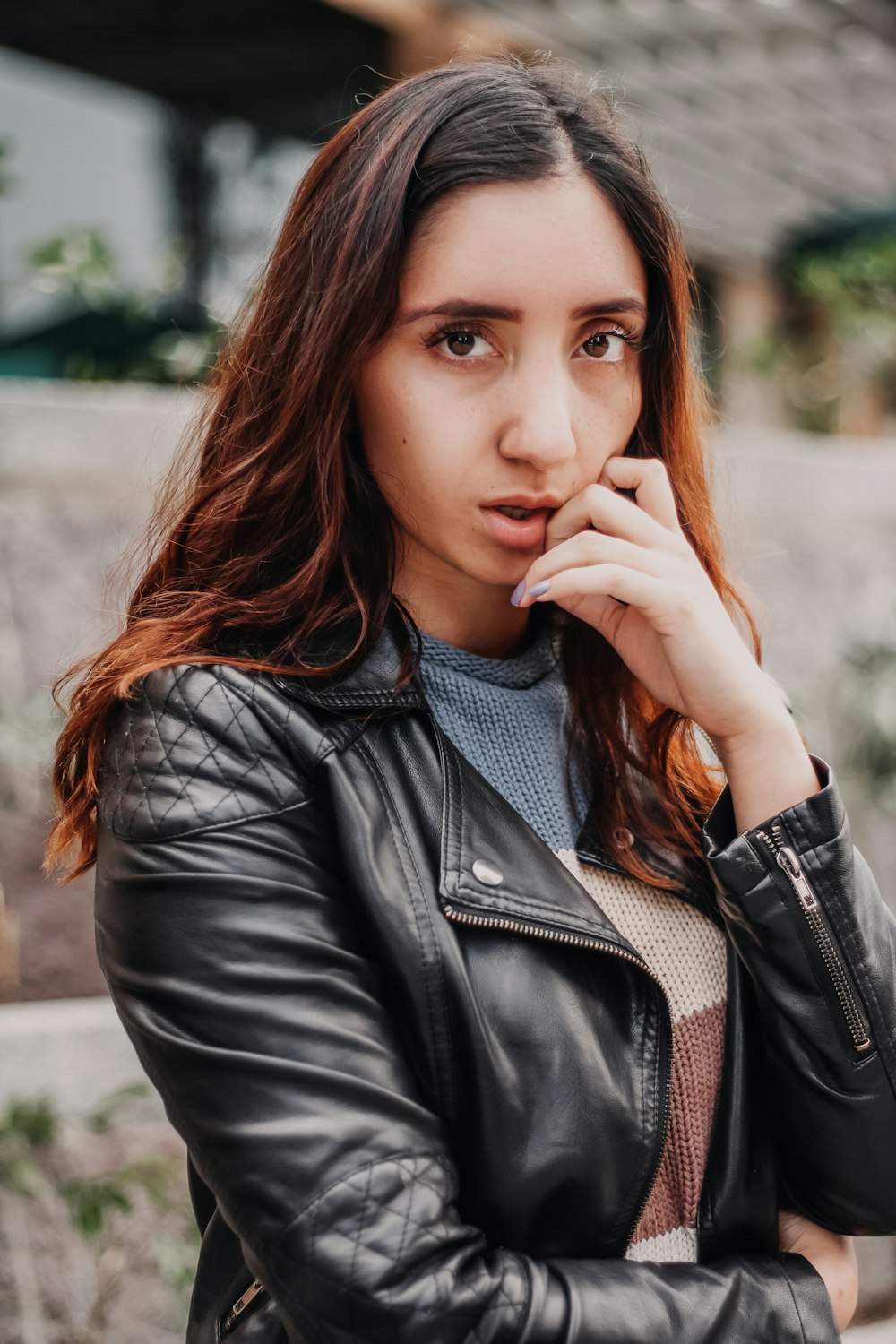 woman in black leather jacket