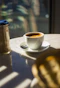 white ceramic cup on saucer