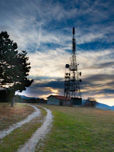 white and red barn and pathpay