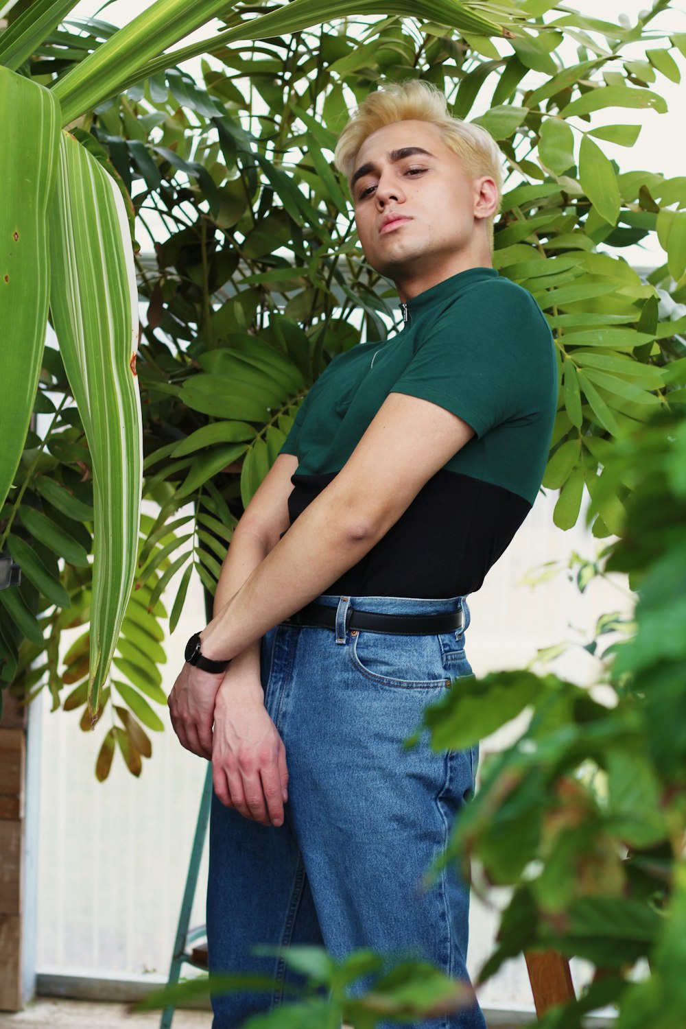 man wearing green and black polo shirt