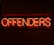A neon sign displaying the word 'OFFENDERS' in vibrant red against a dark background.